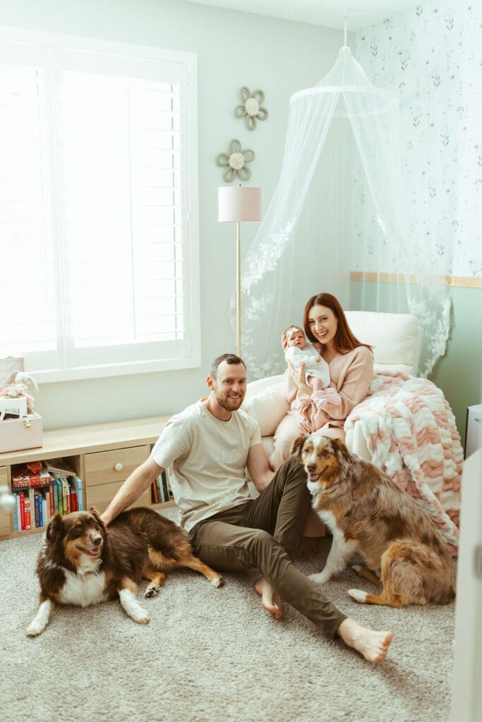 Scottsdale newborn photographer capturing emotional family newborn portraits with soft neutral styling and natural window light