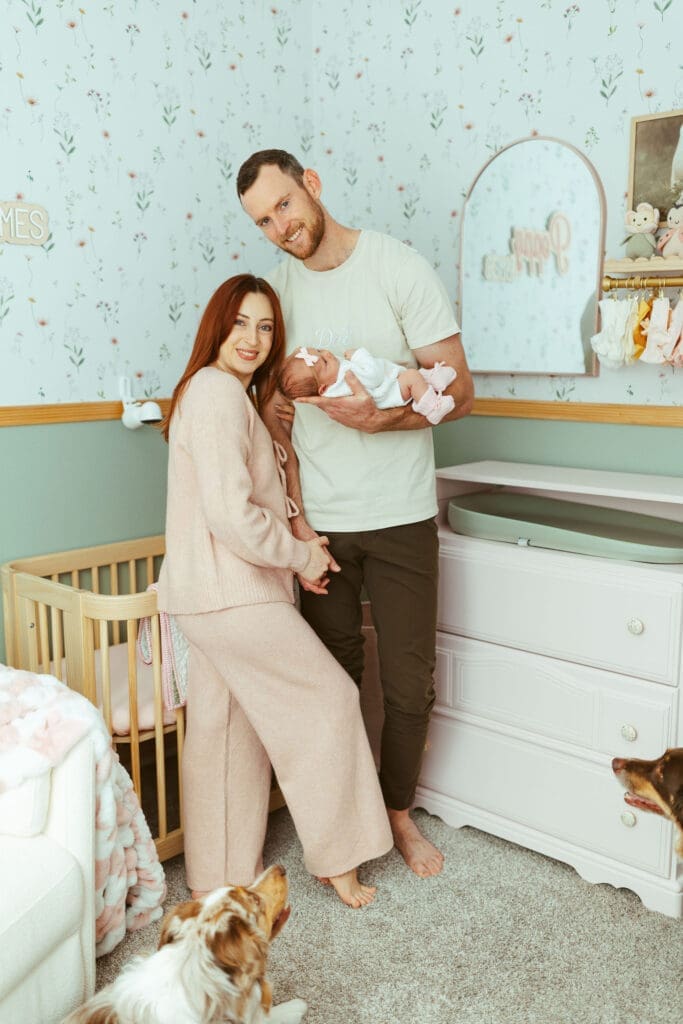 Arizona newborn photographer documenting cozy newborn cuddles and emotional parent connection in luxury family home