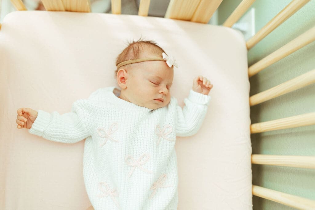 Scottsdale Arizona in-home newborn photography with timeless neutral styling and soft natural light throughout nursery