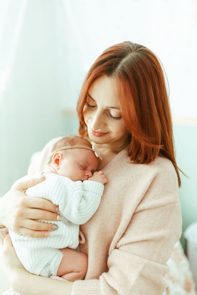 Paradise Valley Arizona newborn photographer capturing soft candid newborn moments between parents and baby girl
