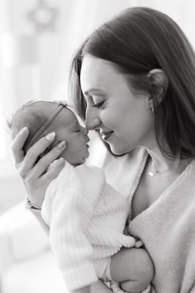 Lifestyle newborn session in Paradise Valley AZ capturing newborn baby sleeping peacefully in beautifully designed nursery