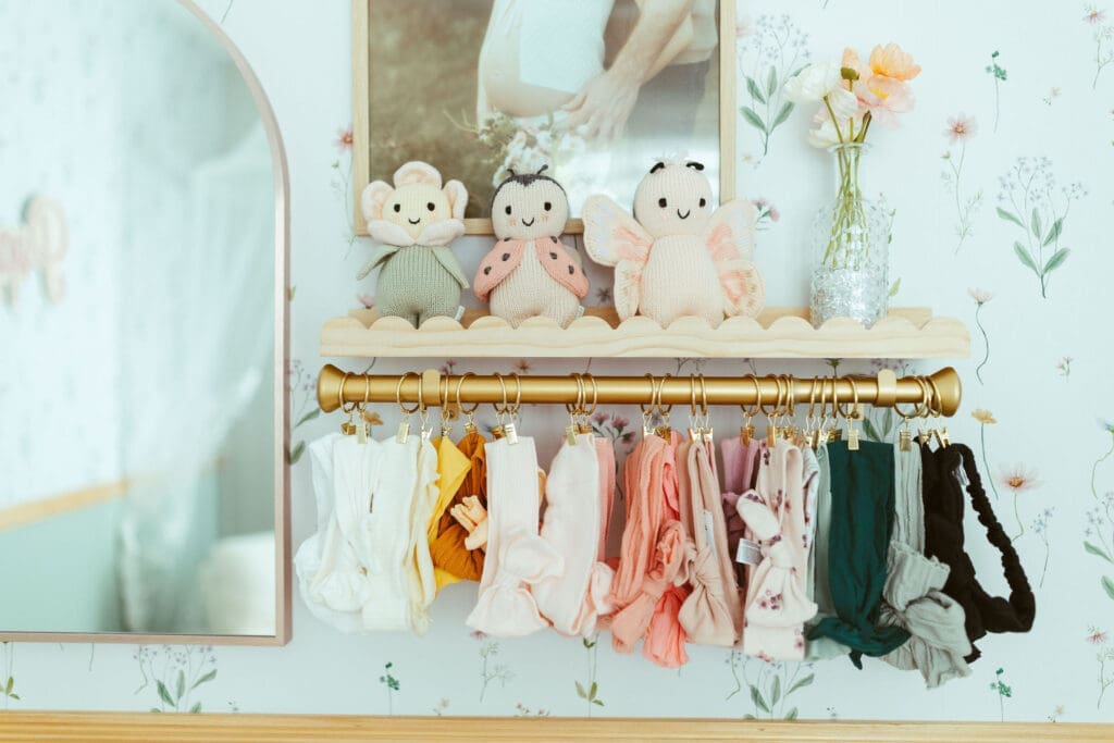 Lifestyle newborn photography in Arizona with emotional parent connection and warm natural window light throughout nursery