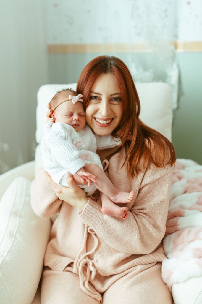 Arizona newborn photographer documenting relaxed newborn family moments with Australian Shepherd dogs in Scottsdale area home