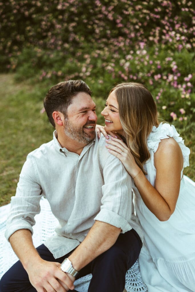 Romantic Arizona couples photography session with soft neutral outfits and glowing sunset light at The Meadow in Mesa AZ