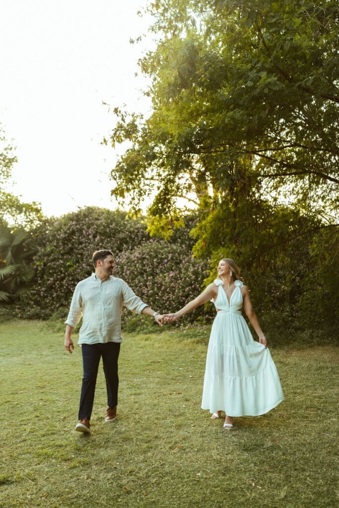 Engagement session at The Meadow in Mesa Arizona featuring elegant white dress and soft earthy neutral styling