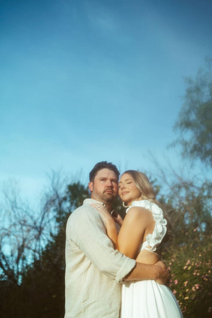 Phoenix engagement photographer capturing close-up romantic couples portraits with soft glowing light and dreamy atmosphere