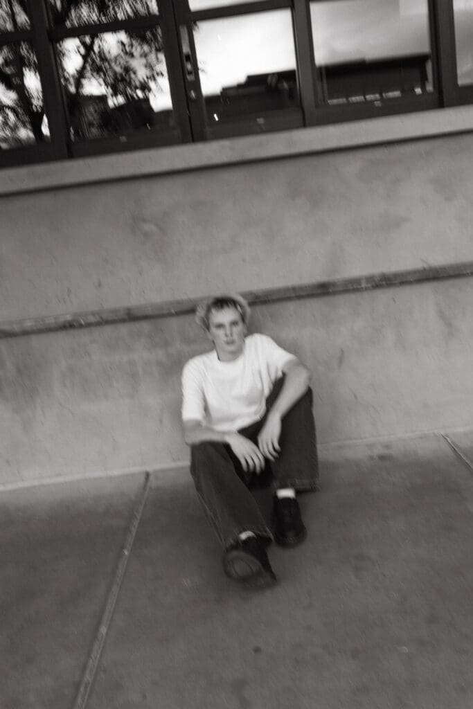 Arizona senior boy session with clean urban architecture and downtown scenery