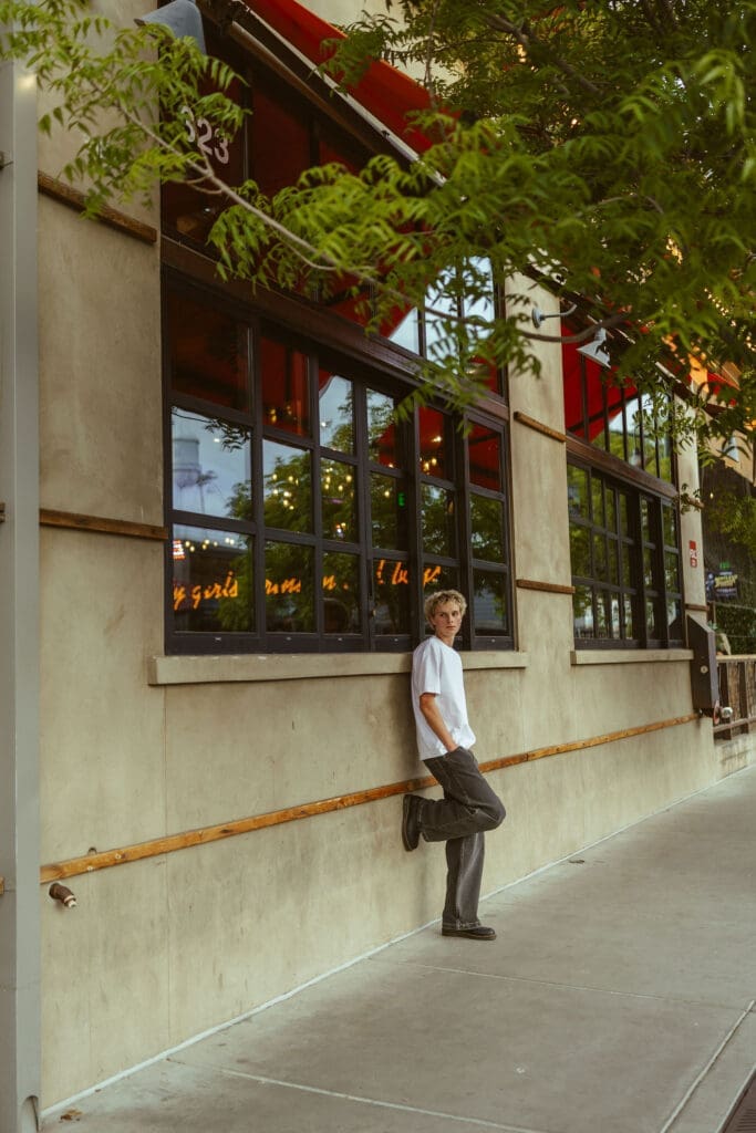 Creative senior pictures for guys in Gilbert Arizona with modern city aesthetic