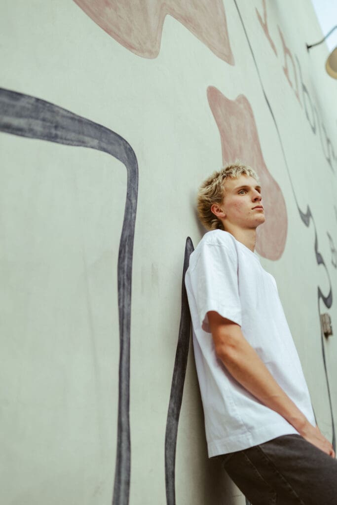 Stylish senior guy session in Downtown Gilbert featuring urban and editorial portraits