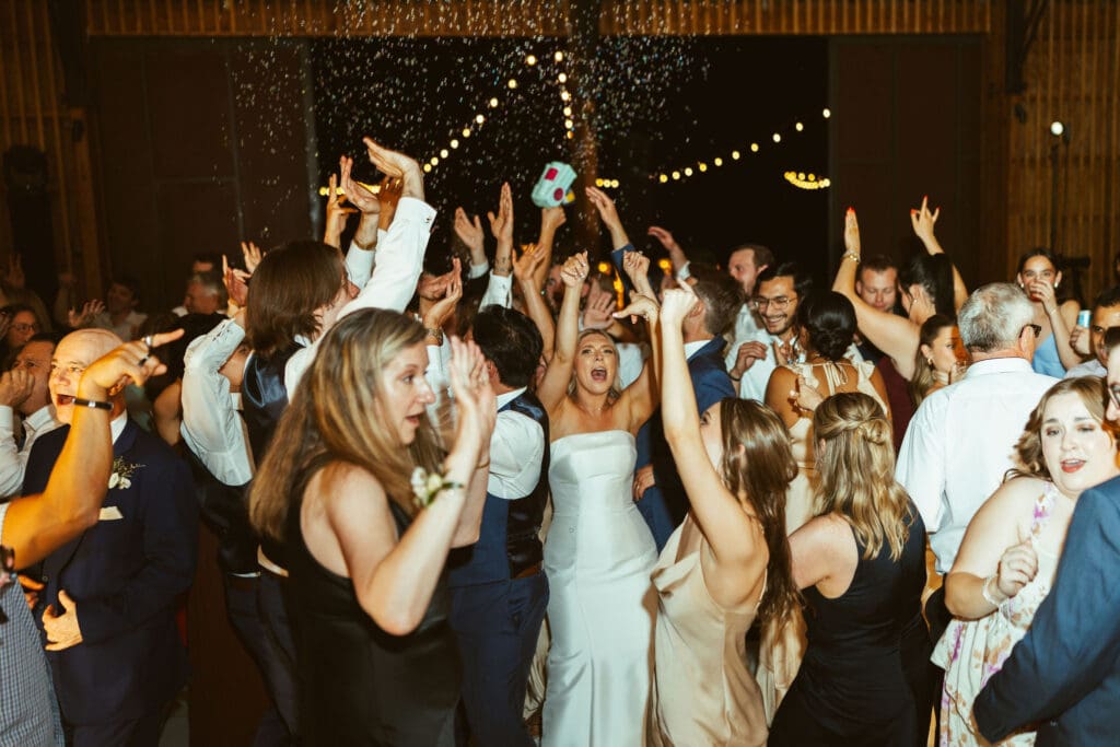 Wedding guests celebrating during reception at The Paseo Arizona wedding venue