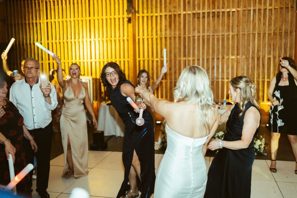 Reception party at The Paseo wedding venue in Apache Junction Arizona with energetic dance floor moments