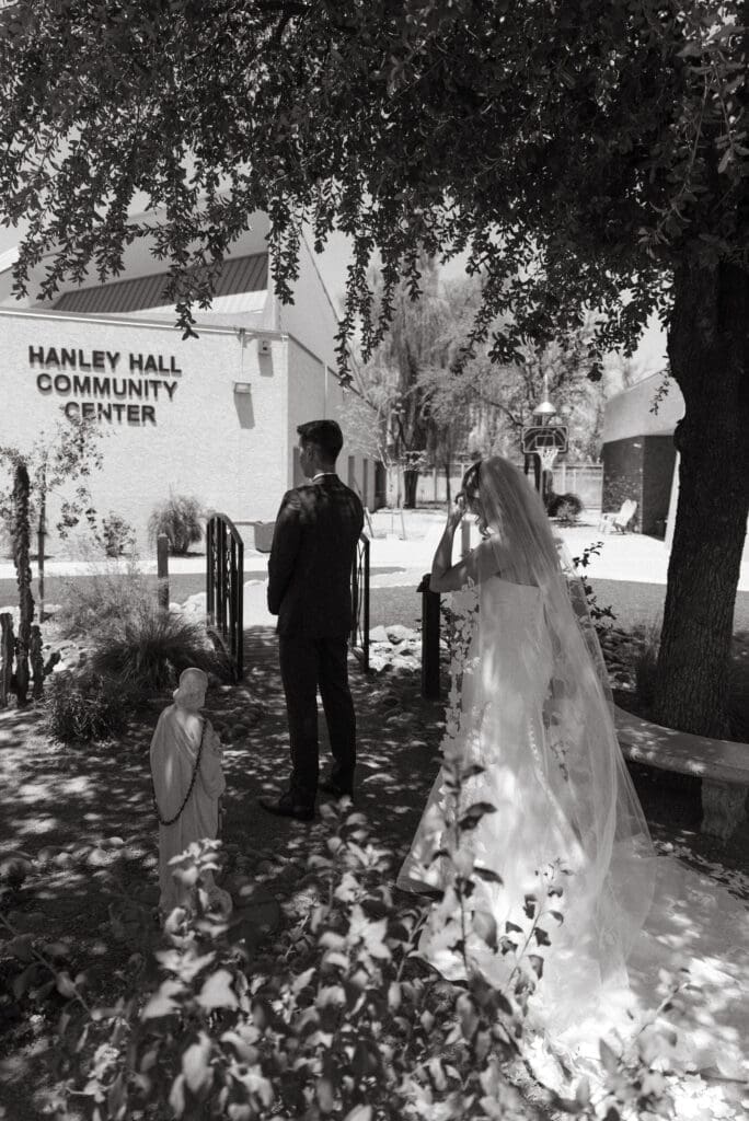 Bride and groom sharing emotional first look before Arizona wedding ceremony