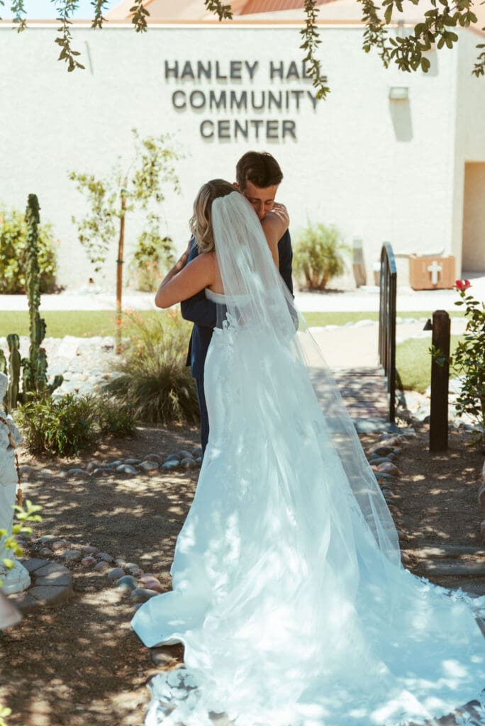 Groom seeing bride for the first time during intimate wedding first look