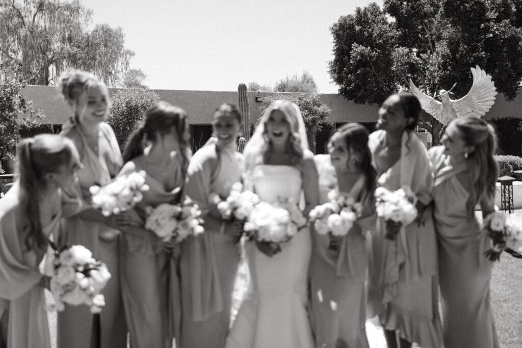 Bridesmaids laughing together during candid wedding moments in Arizona