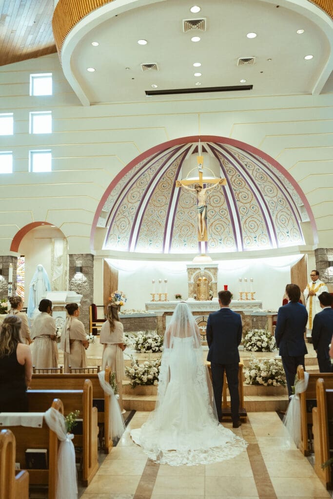 Emotional church wedding moments during Catholic ceremony in Scottsdale Arizona