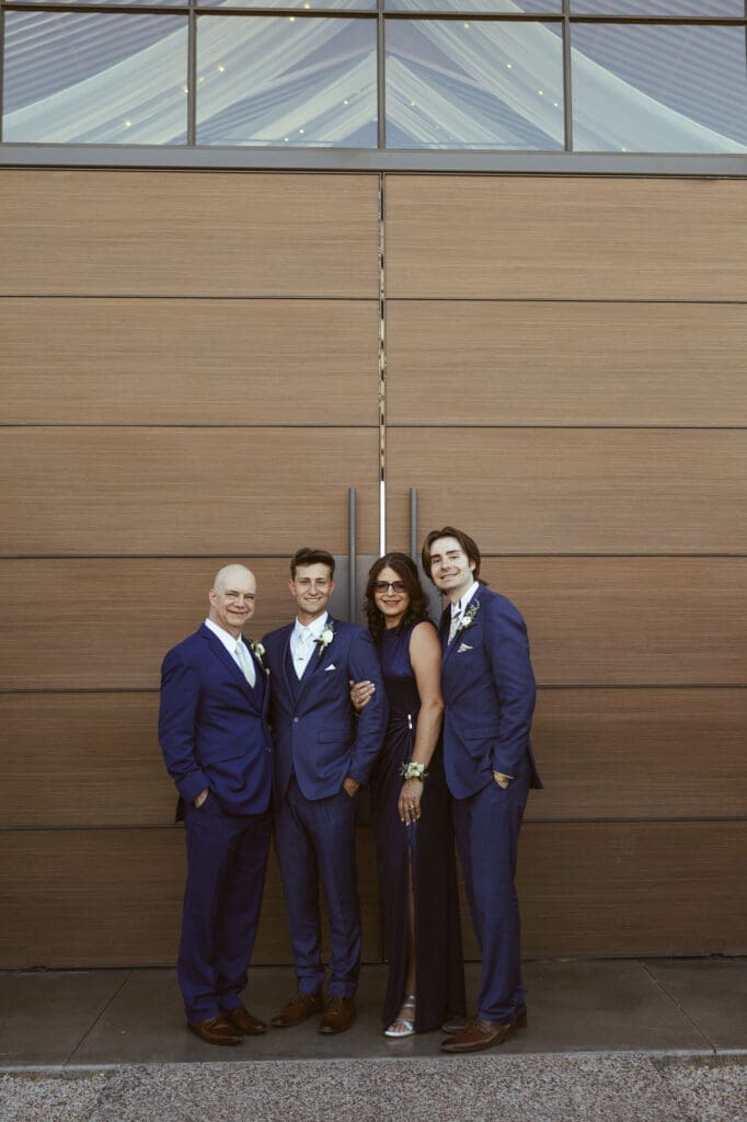 Arizona wedding family photos with bride, groom, and parents in desert setting