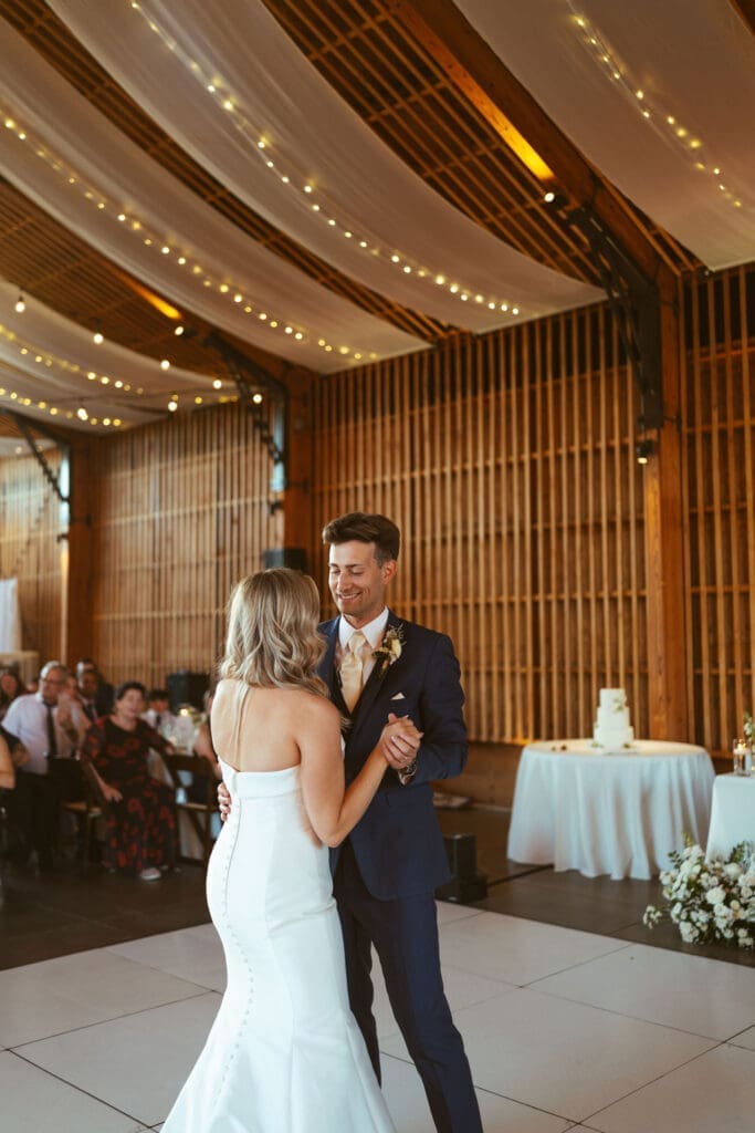 Bride and groom posing at The Paseo wedding venue in Apache Junction Arizona, first dance