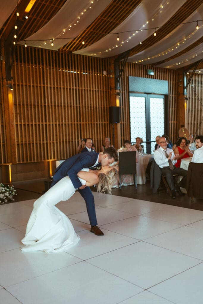 Romantic bride and groom portraits in the Arizona desert at The Paseo, groom dips bride, first dance