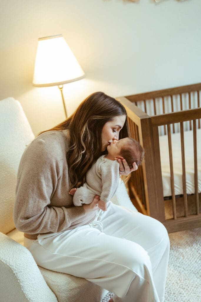 Phoenix area lifestyle newborn photographer documenting relaxed in-home newborn session with parents and newborn baby in Scottsdale Arizona