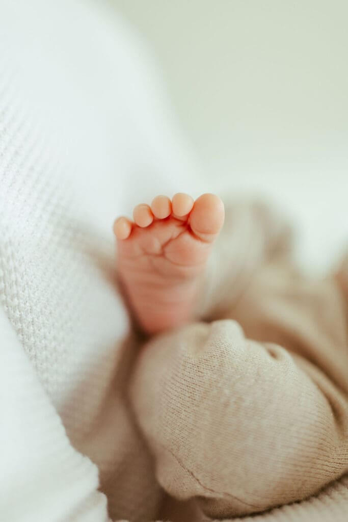 Scottsdale Arizona newborn photography featuring tiny newborn details, baby toes, and organic in-home lifestyle family moments near Mesa and Fountain Hills