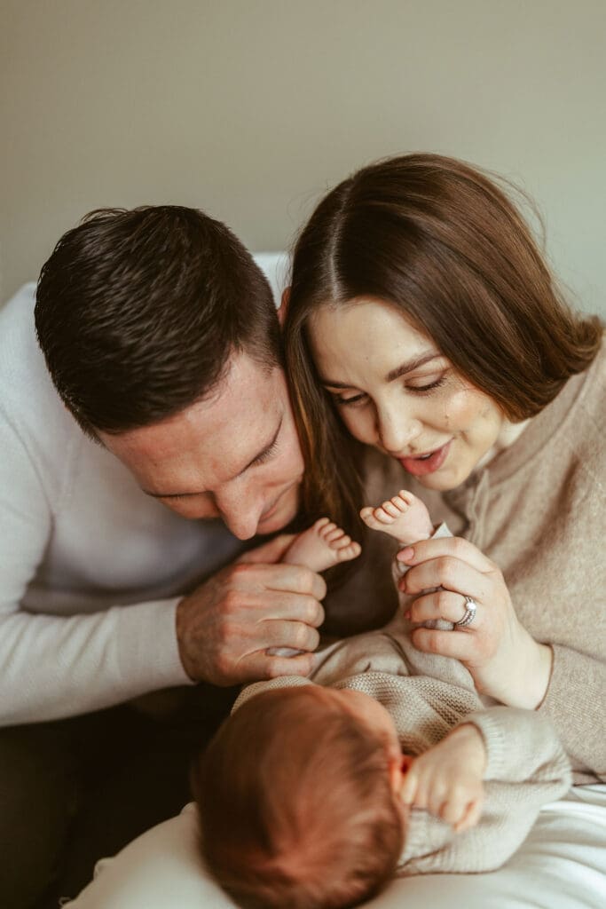 Scottsdale Arizona newborn photography featuring sleeping baby portraits and relaxed family moments during in-home lifestyle newborn session