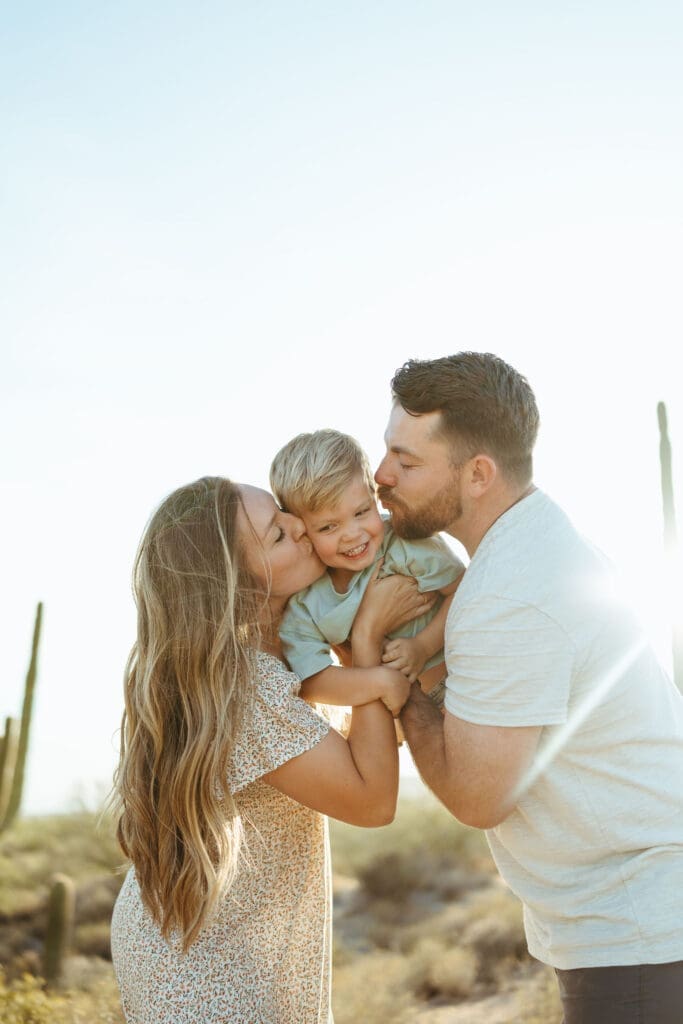 Family pregnancy announcement session in the Superstition Mountains near Apache Junction Arizona at sunset