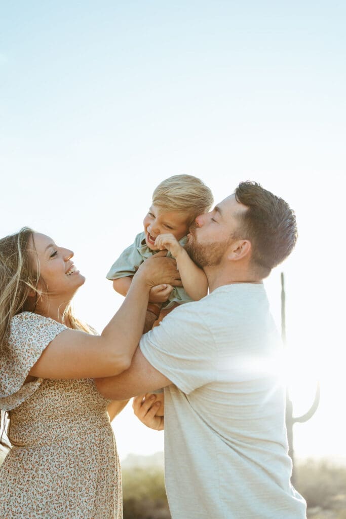 Little boy wearing big bro hat during Arizona pregnancy announcement photo session