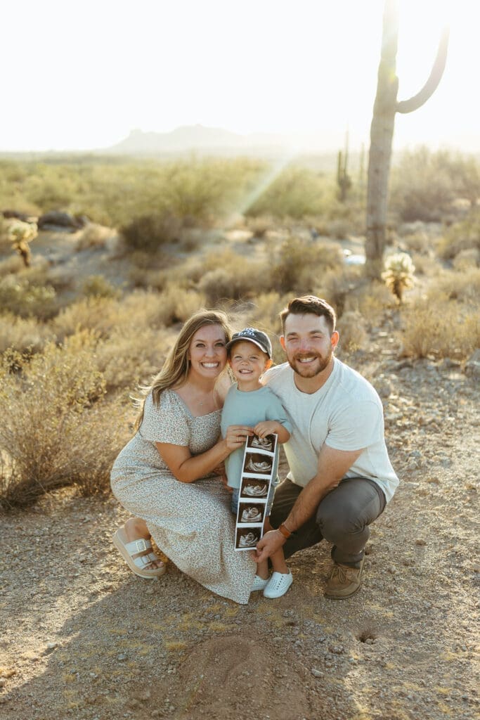 Mesa Arizona maternity photographer capturing candid family moments in the desert