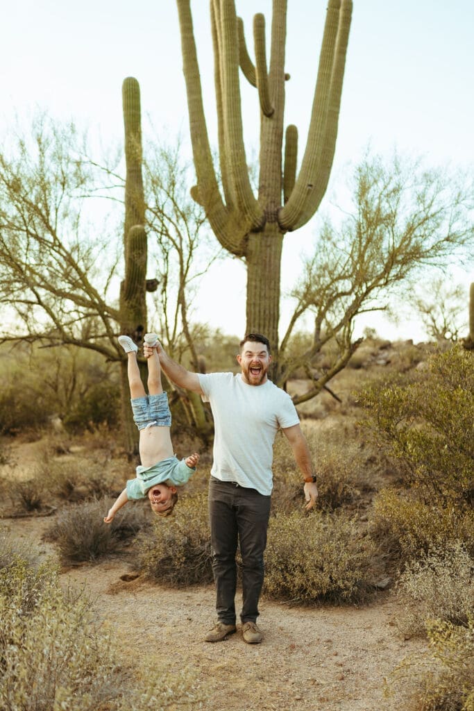 Phoenix Arizona family photographer capturing playful family photos near the Superstition Mountains in Apache Junction Arizona