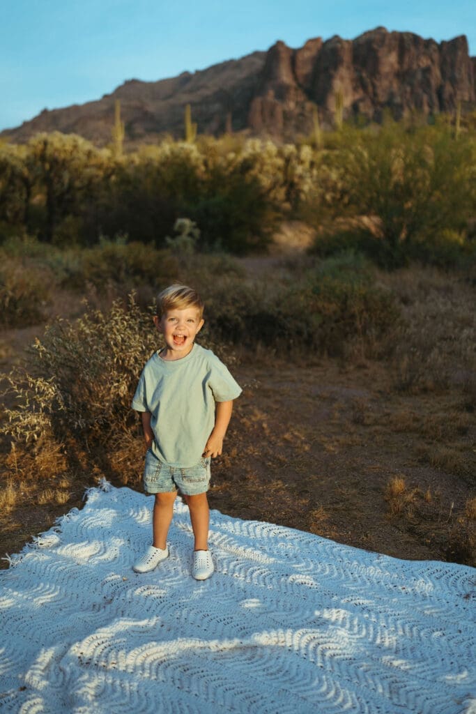 Little boy portrait during family maternity session near the Superstition Mountains in Mesa Arizona
