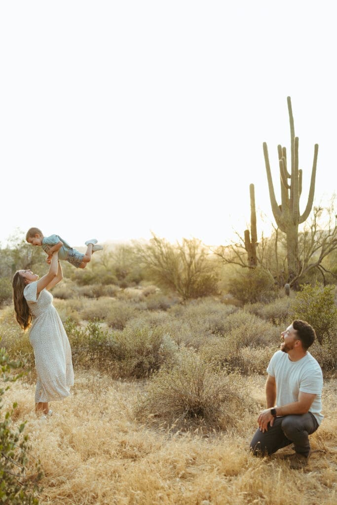 Phoenix Arizona maternity photographer capturing candid pregnancy announcement photos in the desert