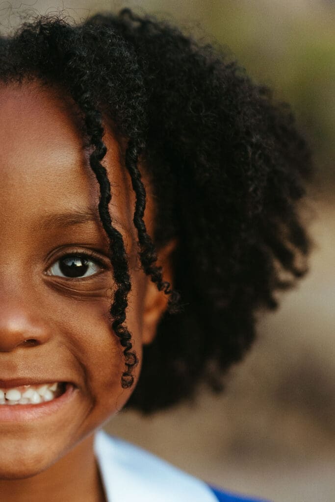 Close-up portrait of a smiling young girl during an Arizona family photography session