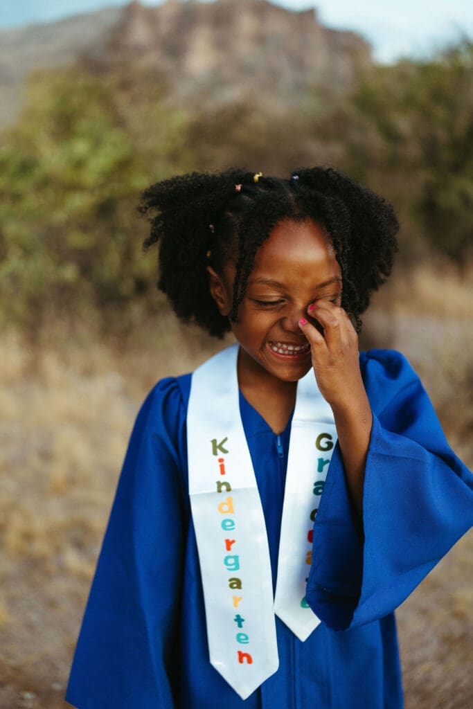 Kindergarten graduation portrait with mountain views near Lost Dutchman State Park