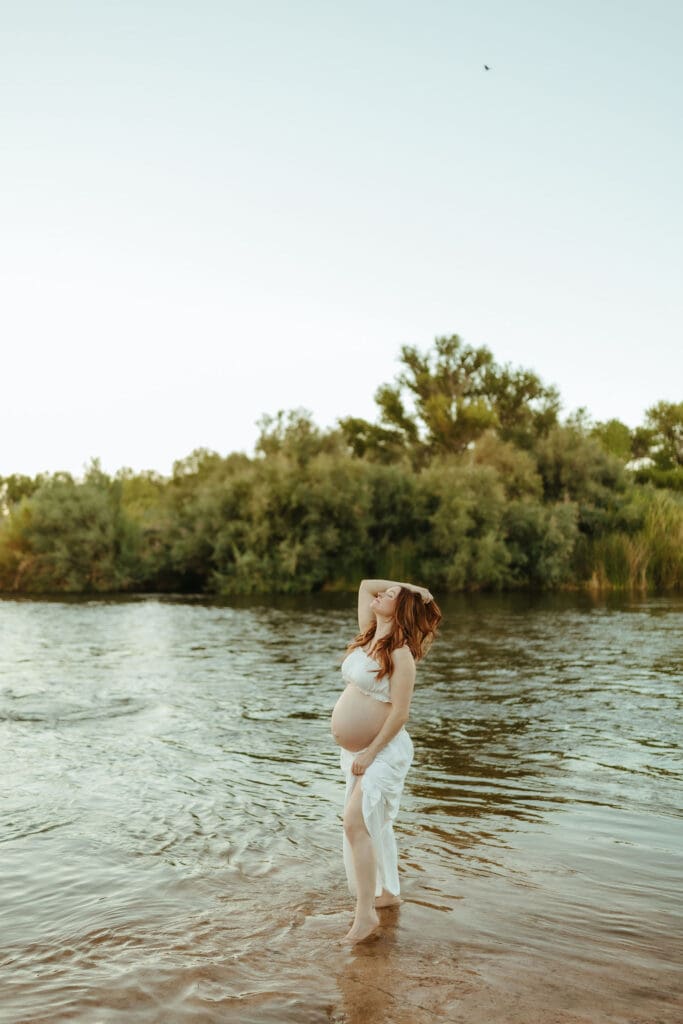 Creative artistic maternity portrait with motion blur at the Salt River in Mesa, Arizona.