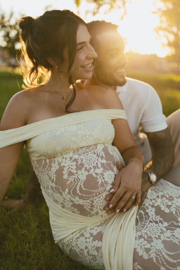 Close-up maternity portrait of an expecting couple during sunset in Gilbert, Arizona.