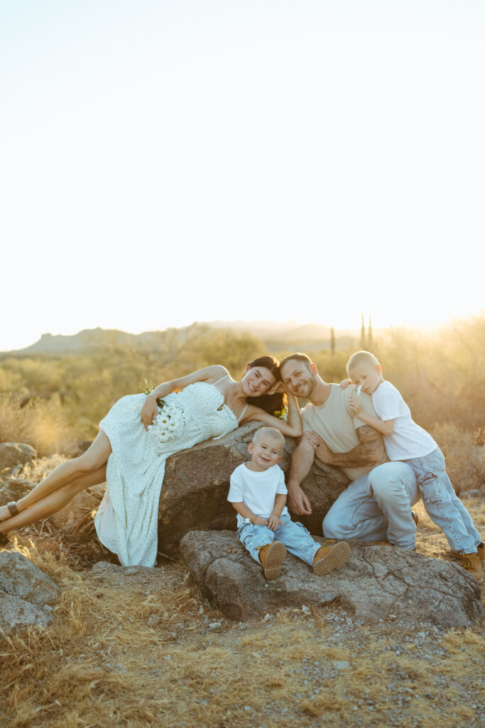 Family maternity portrait at the Superstition Mountains during golden hour in Scottsdale, Arizona