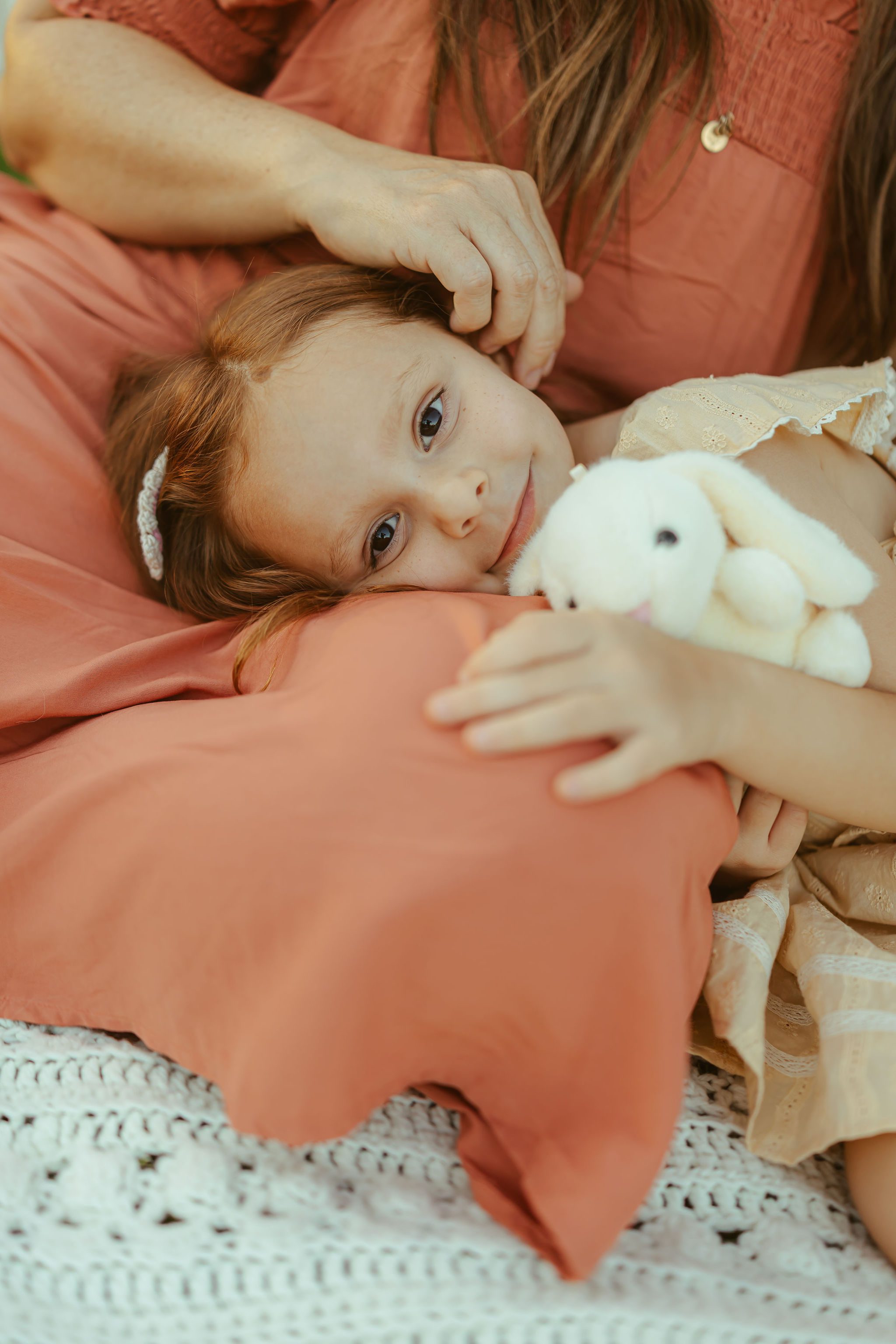 Arizona family photographer capturing a quiet mother and daughter moment during a relaxed family photography session in Gilbert.